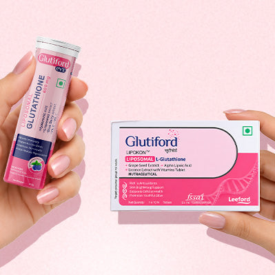 Two hands holding Glutiford Lipokin Glutathione supplement packaging 