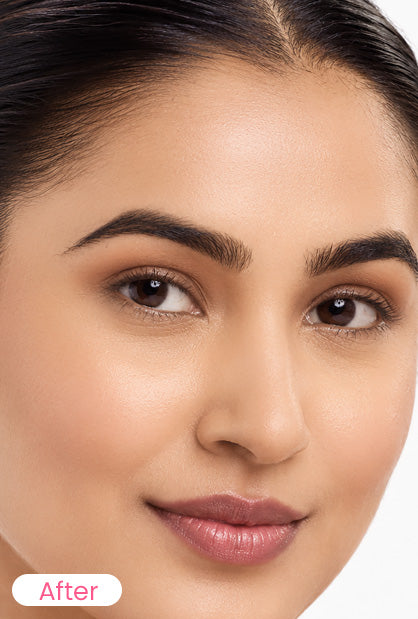 Close-up of a woman's face with smooth, even skin and defined eyebrows